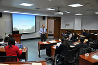 Prof. TF Fok, Pro-Vice-Chancellor of CUHK, gives a presentation at the meeting